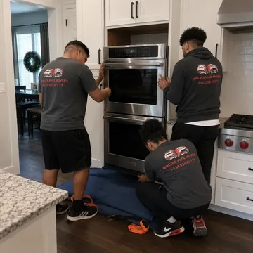 Loading a refrigerator onto a moving truck in Oregon