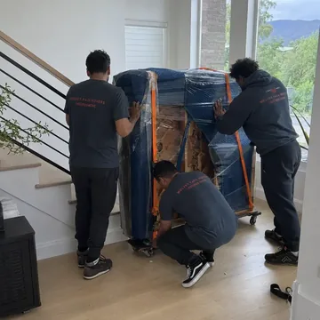 Hot tub movers lifting a spa in Portland, Oregon