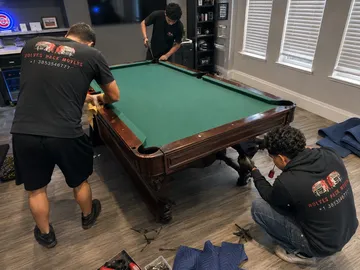 Pool table leveling and reassembly by Utah movers