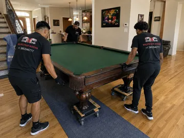 Pool table movers with dollies by Utah team