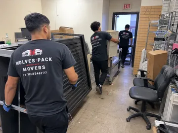 Professional commercial junk removal team clearing office space