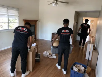 Estate cleanout crew emptying a house in Utah