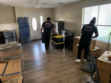 Compassionate estate cleanout service team working respectfully