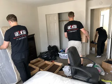 Living room furniture hauled out of a Utah rental